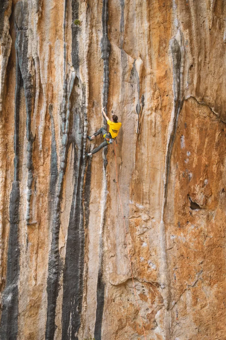 Datça’s Can Baba delivers steep, sculpted features—this frame highlights a full-body kneebar on a long tufa, the kind of move that defines tufa climbing in Turkey.
